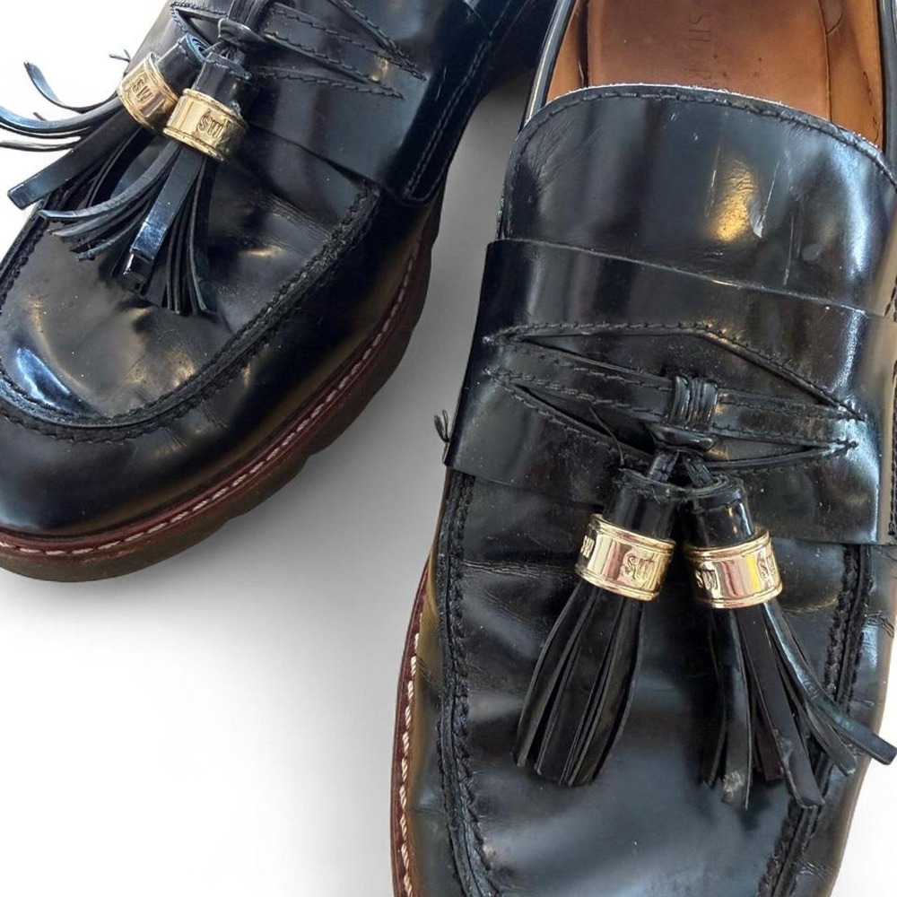 STUART WEITZMAN MANILA women's black leather penny loafer. Size 11.